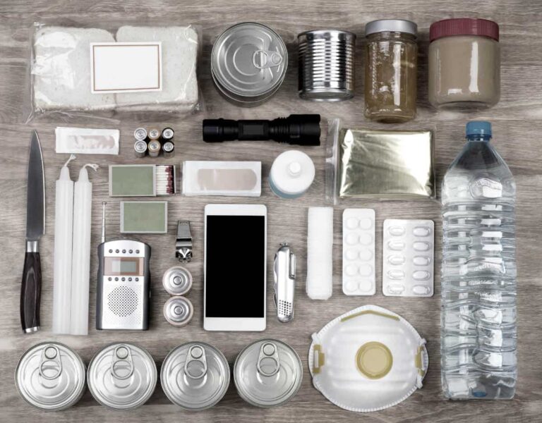 72hr emergency kit contents spread about on table