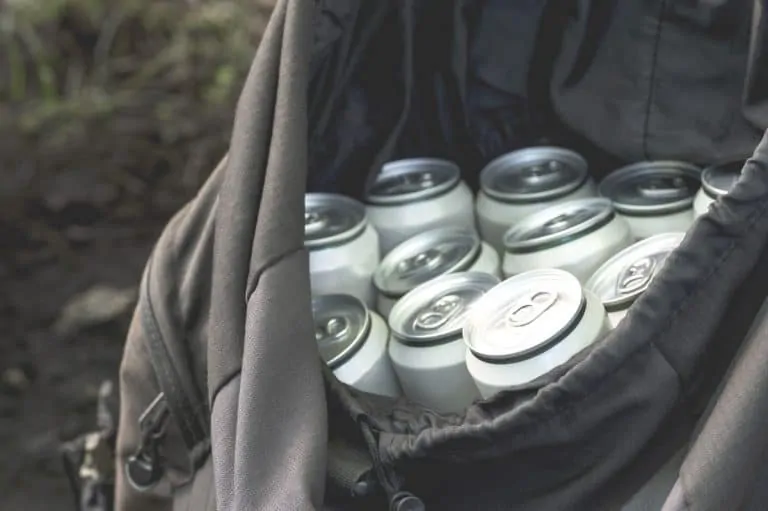 open backpack cooler with multiple cans inside