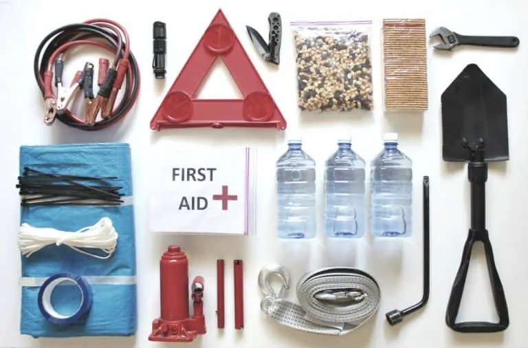 car survival kit laid out on white background