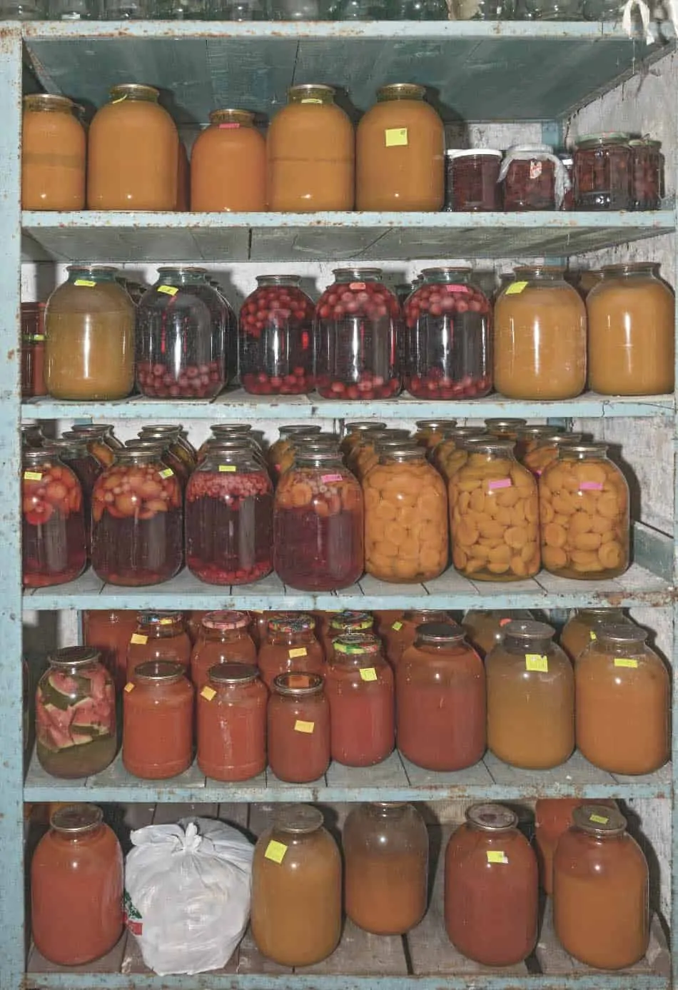 emergency food stores in mason jars on pantry shelving