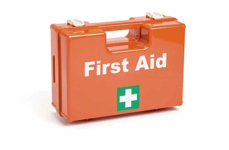 orange first aid case with white text and white cross on green background