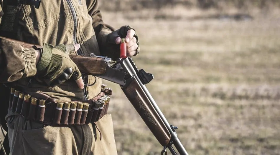 hunter loading shotgun